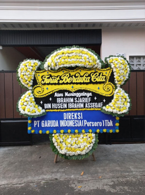 Papan Bunga Duka di Yaniruma